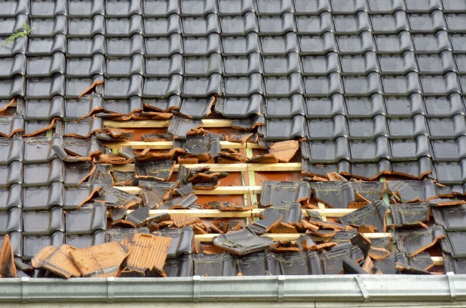 Beschadigde Dakbedekking